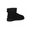 A single black Ugg boot shown from the side. Voir les images du produit