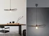 A split image showing a pendant lamp in a dining room setting and a separate product shot. Anteprima dell’immagine prodotto
