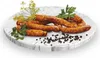 A pile of sausages on a marble-patterned plate, garnished with herbs and peppercorns. Náhled obrázku produktu
