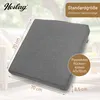 A grey lounge cushion is shown in an outdoor setting, with dimensions and product information overlaid. Produktbild-Vorschau