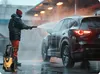 A person is using a pressure washer to clean a car. Náhľad obrázku produktu