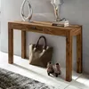 A wooden console table with decorative items and accessories. Produktbild-Vorschau