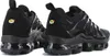 A pair of black Nike Air Vapormax Plus sneakers shown from a rear-side angle against a white background. Náhled obrázku produktu