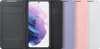 A Samsung Galaxy S21 phone is shown with several different colored protective cases lined up next to it. Náhled obrázku produktu