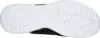 The sole of a black and white athletic shoe is shown from an underneath view. Anteprima dell’immagine prodotto