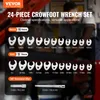 A marketing image showcasing a 24-piece crowfoot wrench set with metric and SAE sizes, along with extension bars. The background shows a blurred workshop environment with people. Voir les images du produit