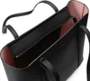 A black tote bag with a pink interior is shown from a top-down perspective. Podgląd zdjęcia produktu