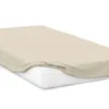 A beige fitted sheet is shown on a mattress. Produktbild-Vorschau