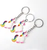 Three unicorn keychains arranged diagonally on a white background. Produktbild-Vorschau