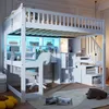 A white loft bed with an integrated desk and shelving unit, illuminated by blue LED lights. Produktbild-Vorschau