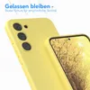 A yellow phone case is shown with a close-up of its camera lenses and a portion of the phone screen displaying a nature scene. Produktbild-Vorschau