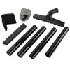 A collection of vacuum cleaner attachments laid out on a white background. Produktbild-Vorschau