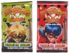 Two sealed packs of Miraculous Secrets trading cards, side-by-side. Produktbild-Vorschau
