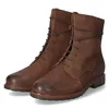 A pair of brown leather lace-up boots. Produktbild-Vorschau