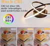 A modern LED ceiling lamp with a geometric design, shown with text explaining its high CRI (Color Rendering Index) and comparative images of food under different CRI levels. Produktbild-Vorschau