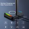 Close-up of a black desk lamp base with RGB lighting, showing various ports and a wireless charging pad. Icons representing different devices are displayed below. Podgląd zdjęcia produktu