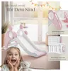 A young girl is excitedly looking at a pink and white children's slide indoors, with additional close-up shots of the slide's features. Náhled obrázku produktu