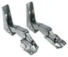 A pair of metal refrigerator door hinges shown against a white background. Produktbild-Vorschau