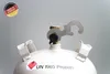 Close-up of the top of a white gas cylinder with a metal tool attached to the valve. Produktbild-Vorschau