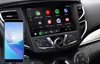 A smartphone connected to a car's infotainment system, displaying Android Auto. Produktbild-Vorschau