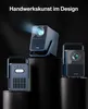 Three dark blue projectors are displayed on black pedestals against a black background. The projector in the center is projecting a beam of light. Produktbild-Vorschau