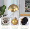 A close-up collage of a gold floor lamp, highlighting its features. Voir les images du produit