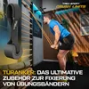 A man is performing a resistance band exercise using a wall-mounted gym system and a door anchor accessory. Produktbild-Vorschau