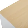 A close-up view of the top surface of a wooden sideboard with a white side panel visible. Anteprima dell’immagine prodotto