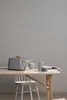 A toaster and mugs are on a wooden table, with a chair visible. Anteprima dell’immagine prodotto