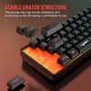 Close-up of a mechanical keyboard with some keys detached, showcasing its internal lighting. Produktbild-Vorschau