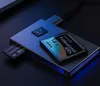 A close-up shot of a card reader with several memory cards inserted and placed on top, with blue LED lights on the side. Náhled obrázku produktu