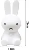 A white rabbit-shaped night light with dimensions indicated. Produktbild-Vorschau