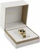 A gold Versace watch is displayed in its white and gold presentation box. Produktbild-Vorschau