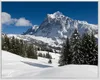 Wallario Wandbild Verschneiter Berghang unter blauem Produktbild-Vorschau 1