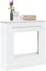 A white fireplace surround with decorative items on top. Voir les images du produit