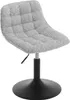 A gray upholstered stool with a black base is shown against a white background. Produktbild-Vorschau
