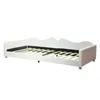 A white daybed with a wooden slat mattress support is shown against a white background. Produktbild-Vorschau