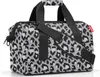 A leopard print duffel bag with black straps and handles, presented against a white background. Náhľad obrázku produktu