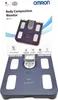 A body composition monitor is shown on its packaging. Podgląd zdjęcia produktu
