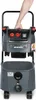 A person's hand is holding the handle of a Starmix wet/dry vacuum cleaner. Anteprima dell’immagine prodotto