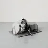 Kitchenware drying rack with pots and lids. Produktbild-Vorschau