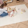 A mother is playing with her baby on a play mat. Náhľad obrázku produktu