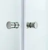 A close-up view of two chrome handles on a shower door. Produktbild-Vorschau