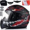 A full-face motorcycle helmet with a graphic design, along with accessories and packaging, displayed against a white background. Produktbild-Vorschau