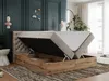 A bedroom scene featuring an open storage bed with a mattress. Produktbild-Vorschau