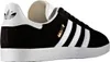 A side view of a black Adidas Gazelle sneaker with white stripes and sole. Produktbild-Vorschau