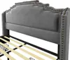 A close-up view of the headboard and frame of a bed. Náhled obrázku produktu