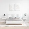 A clean, minimalist bedroom scene featuring a white bed with grey bedding, flanked by two white floating nightstands. Two abstract line art prints hang on the wall above the bed. Produktbild-Vorschau