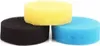 Three round foam filters in black, yellow, and blue, stacked on a white background. Produktbild-Vorschau
