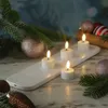 LED Mini Teelichter - 4 wiederaufladbare LED Teelichter mit Ladestation/Fernb. - Timer - für Außen Produktbild-Vorschau